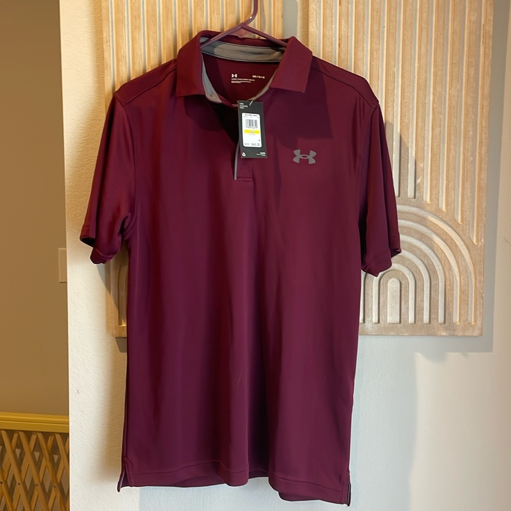 Men’s Under Armour Polo. Never been worn. Size medium.